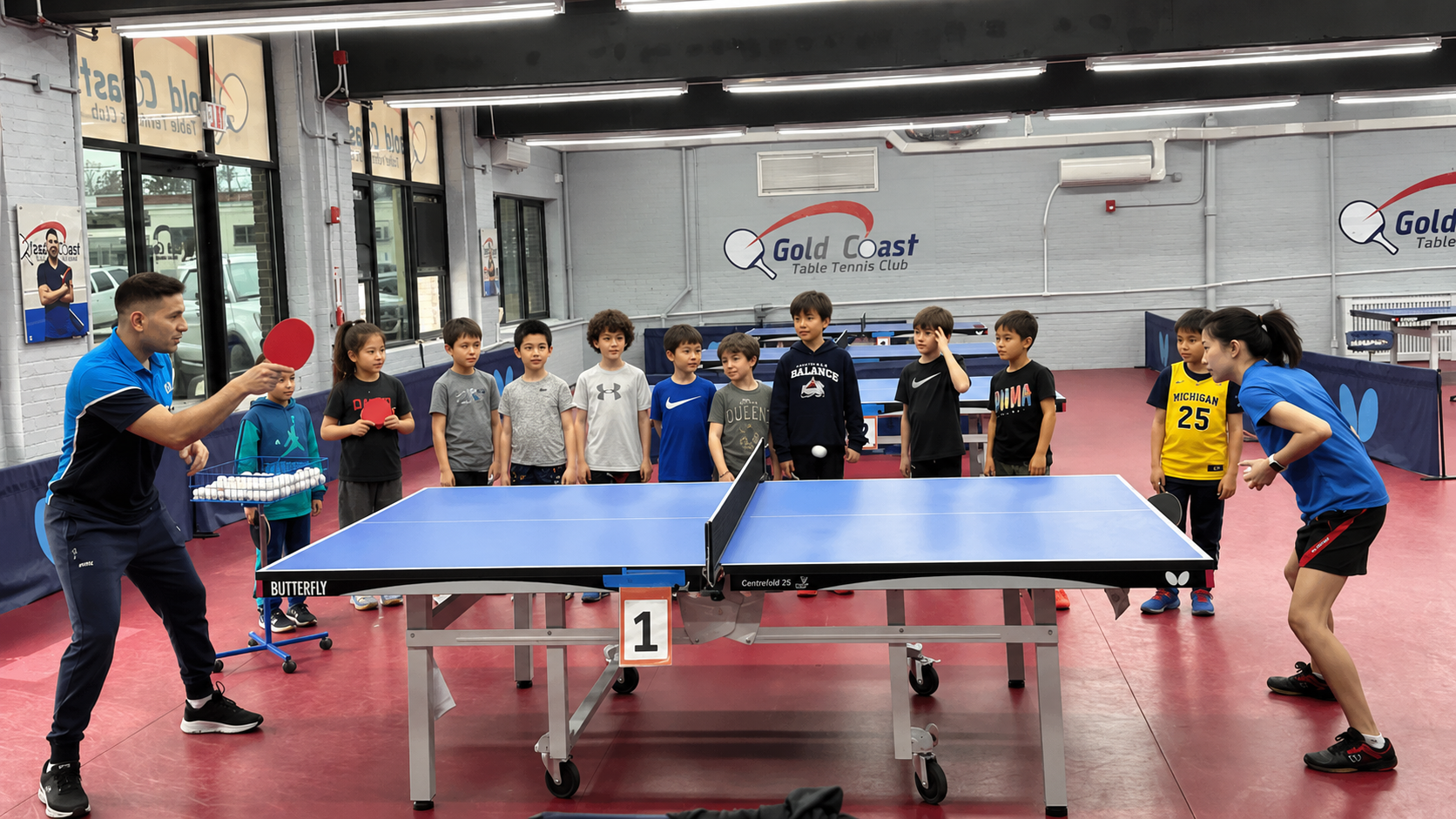 Coach Ahmed teaching kids at Gold Coast Table Tennis Club